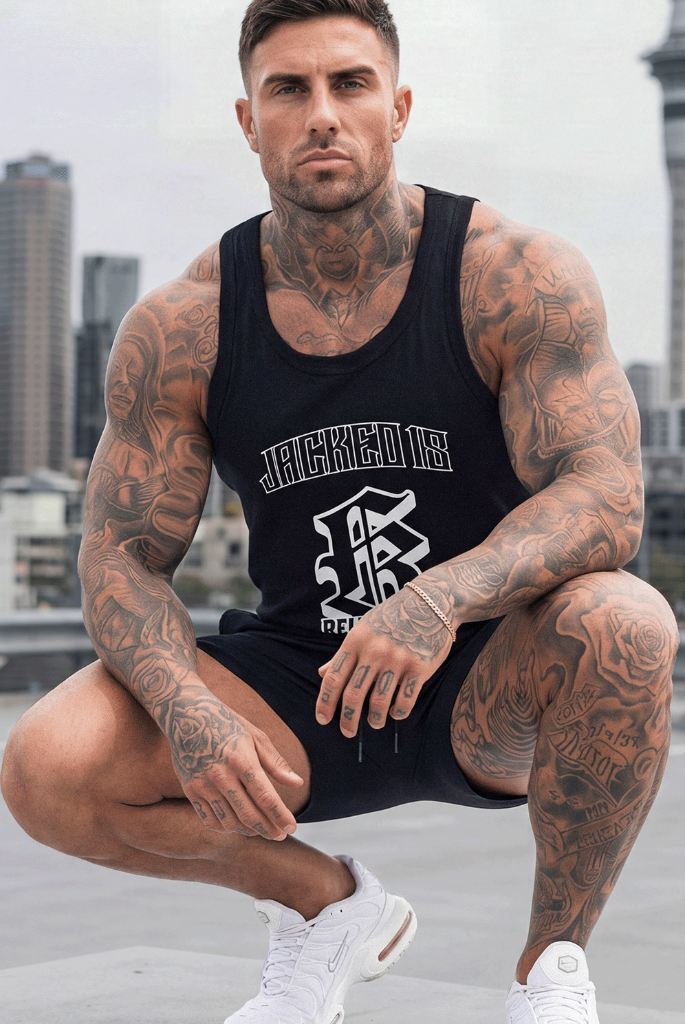 RTLS 1018 Relentless Singlet in black, a 150 GSM combed cotton bodybuilding singlet with Relentless 18 front graphic