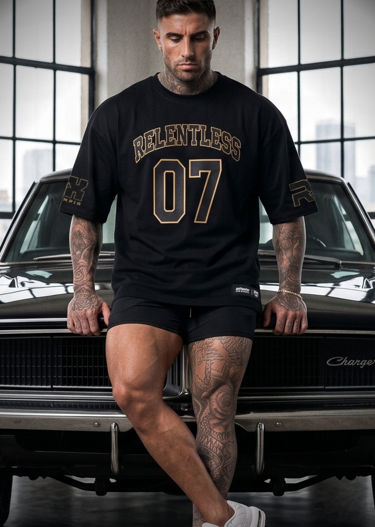 4018 Arnold 07 Oversized Tee black, front, RELENTLESS 07 chest print in gold keyline