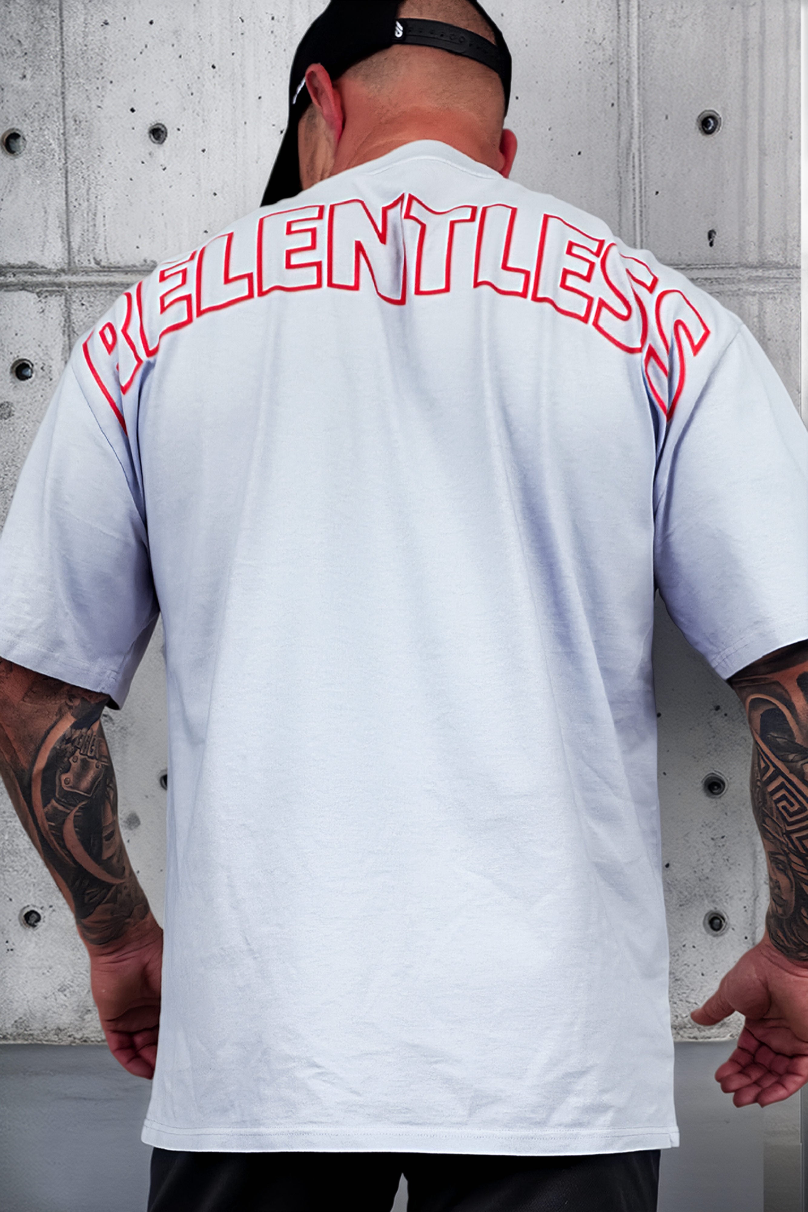 JCKD 4018 The Ark Oversized Tee blue, bold Relentless logo on drop shoulder cut oversized gym tee