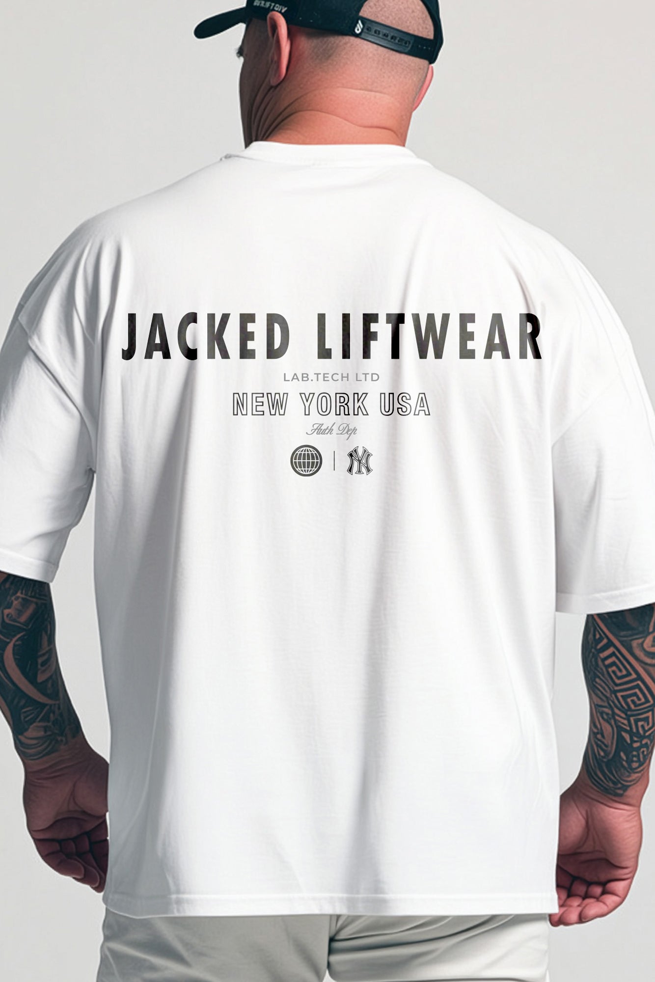 JCKD 4018 Mighty Joe Oversized Tee white, strongman tribute graphic on drop shoulder oversized gym tee