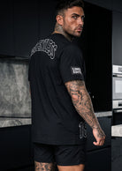 RTLS 4018 OG Relentless Oversized Tee in black, drop shoulder cut sized up to 3XL
