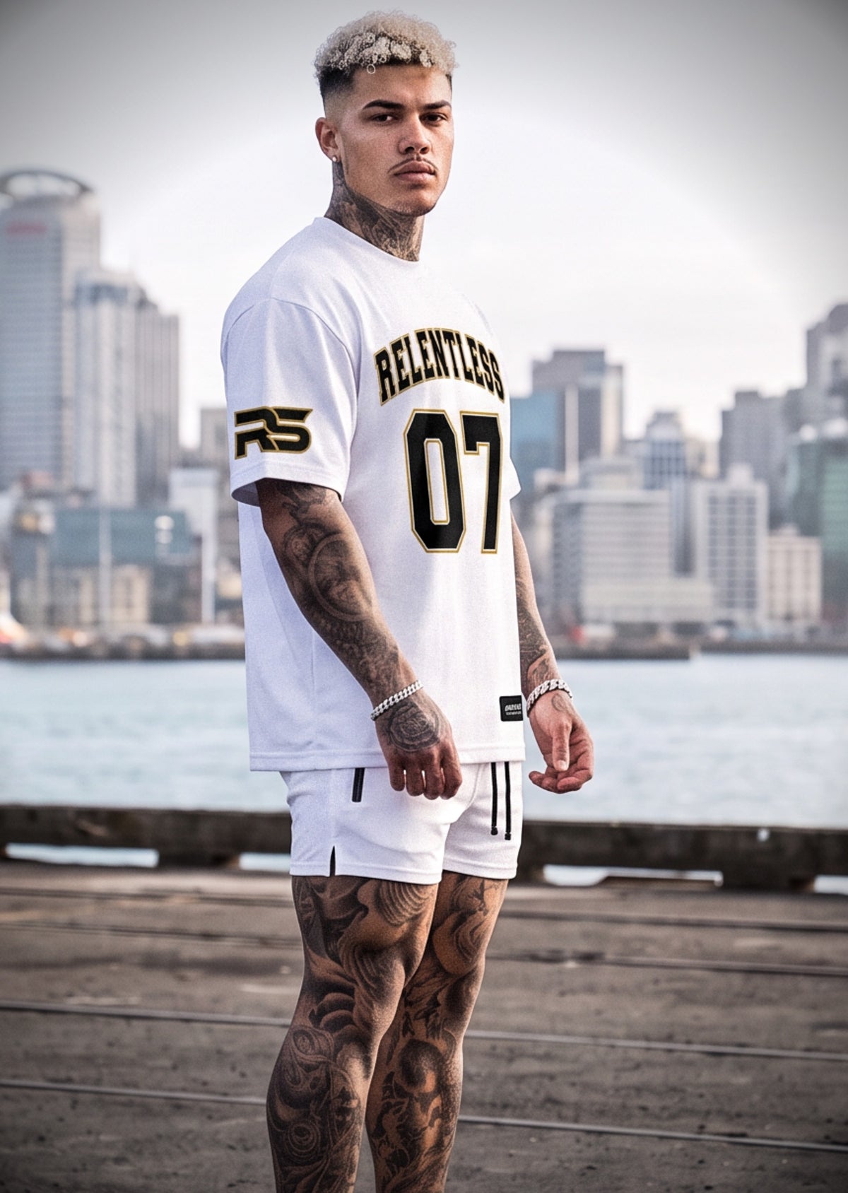 4018 Arnold 07 Oversized Tee white, front, RELENTLESS 07 chest print in black with gold keyline